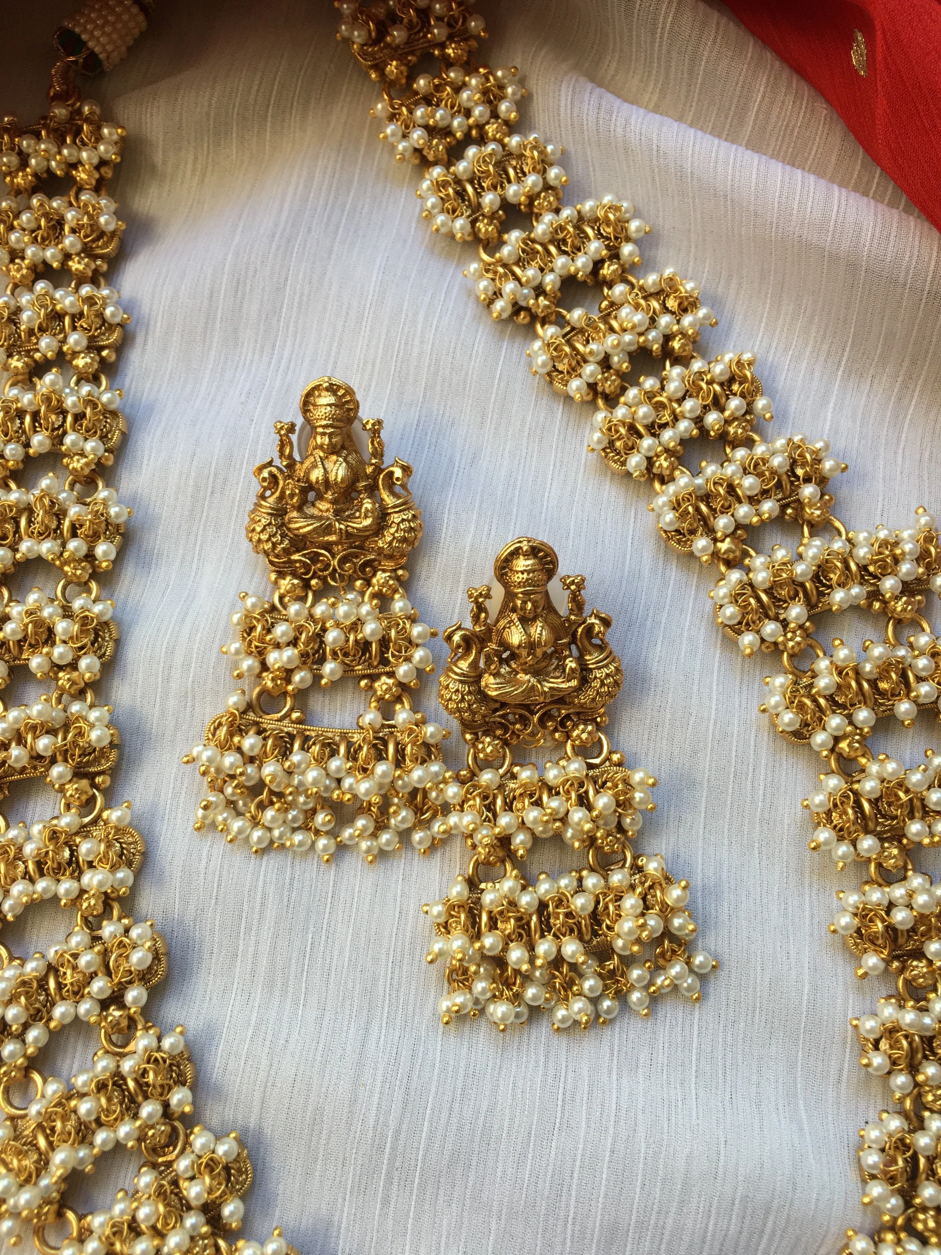 Pearl bunches Haaram with premium polish Lakshmi Devi pendant LH68